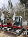 2018 Takeuchi TB250 mini excavator, front three-quarter view