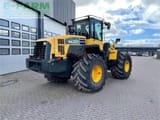 2007 Komatsu WA320-5 wheel loader, rear three-quarter view