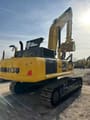 2023 Komatsu PC450 crawler excavator rear three-quarter view