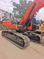 2024 Doosan DX225LCA crawler excavator, side view