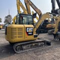 2021 Caterpillar 306E2 mini excavator, rear three-quarter view