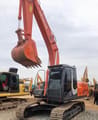 Hitachi ZX200-3 crawler excavator, front three-quarter view