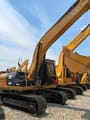 Koparka gąsienicowa 2024 Caterpillar 320D, widok z boku