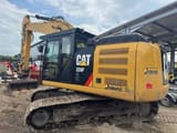 2018 Caterpillar 326FL crawler excavator, side view