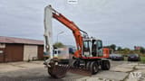 1995 Atlas 1404 wheel excavator, side view
