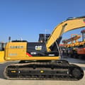 2022 Caterpillar 323DL crawler excavator, side profile view