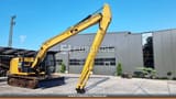 2016 Caterpillar 312EL crawler excavator, side profile view