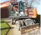 2014 Hitachi ZX140W-5 wheel excavator side view