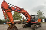 2003 Kobelco EX 285 crawler excavator, front three-quarter view