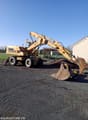 1979 Liebherr 911 wheel excavator, side profile view