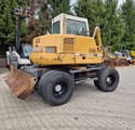 1999 Liebherr 308 wheel excavator, rear three-quarter view