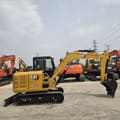 2023 Caterpillar 305.5E mini excavator side view