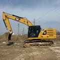 2021 Caterpillar 320GC crawler excavator, side profile view
