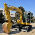 2023 Komatsu PC78US-6 mini excavator, front three-quarter view