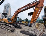 Case CX240B crawler excavator, side view