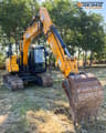 2019 JCB JS131LC excavator, front three-quarter view