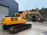 2006 Hyundai 210-LC-3 excavator, rear three-quarter view