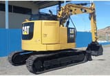 2015 Caterpillar 314F crawler excavator, rear three-quarter view