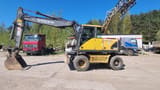 1999 Volvo EW160 wheel excavator, side view