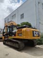 Caterpillar 330D crawler excavator, rear three-quarter view