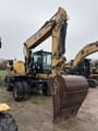 2013 Caterpillar M316D wheel excavator, front three-quarter view