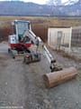 2012 Takeuchi TB 228 mini excavator, front three-quarter view