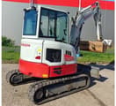 2024 Takeuchi TB 335 R mini excavator, rear three-quarter view