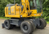 2011 Komatsu PW148 wheel excavator side view
