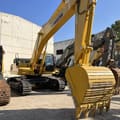 Komatsu PC450-8 crawler excavator, front three-quarter view