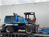 2013 Fuchs MHL320 material handler, side view