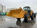 2020 Caterpillar 966H wheel loader, front three-quarter view