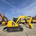 Komatsu PC70-8 mini excavator, side profile view