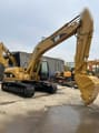 Koparka gąsienicowa 2024 Caterpillar 320CL, widok z boku