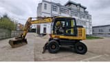 Komatsu PW148-8 wheel excavator, side profile view