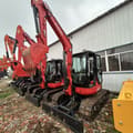 2023 Kubota U55-4 mini excavator, front three-quarter view