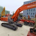 Hitachi ZX240 crawler excavator, rear three-quarter view