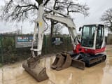 2015 Takeuchi TB250 mini excavator side view