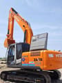 2024 Hitachi Zaxis 200 crawler excavator, rear three-quarter view