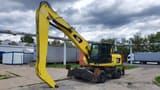 2011 Caterpillar M318D MH material handler, side profile view