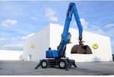2016 Fuchs MHL350 material handler, side view