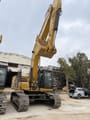 2025 Caterpillar 336GC crawler excavator, front three-quarter view