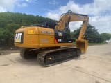 2020 Caterpillar 320D2 L crawler excavator, rear three-quarter view