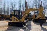 2025 Komatsu PC55 MR mini excavator, side view