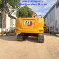 2023 Caterpillar 320GC crawler excavator, rear view