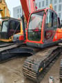 2019 Doosan DX225LC crawler excavator, front three-quarter view