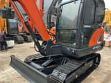 2022 Doosan DX60-9C crawler excavator, side view