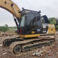 2020 Caterpillar 323DL crawler excavator, side view