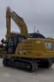 2023 Caterpillar 320GC crawler excavator, rear three-quarter view
