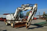 2008 CASE WX145 wheel excavator, front three-quarter view