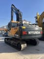 2023 Hyundai R220LC-9S crawler excavator, rear three-quarter view